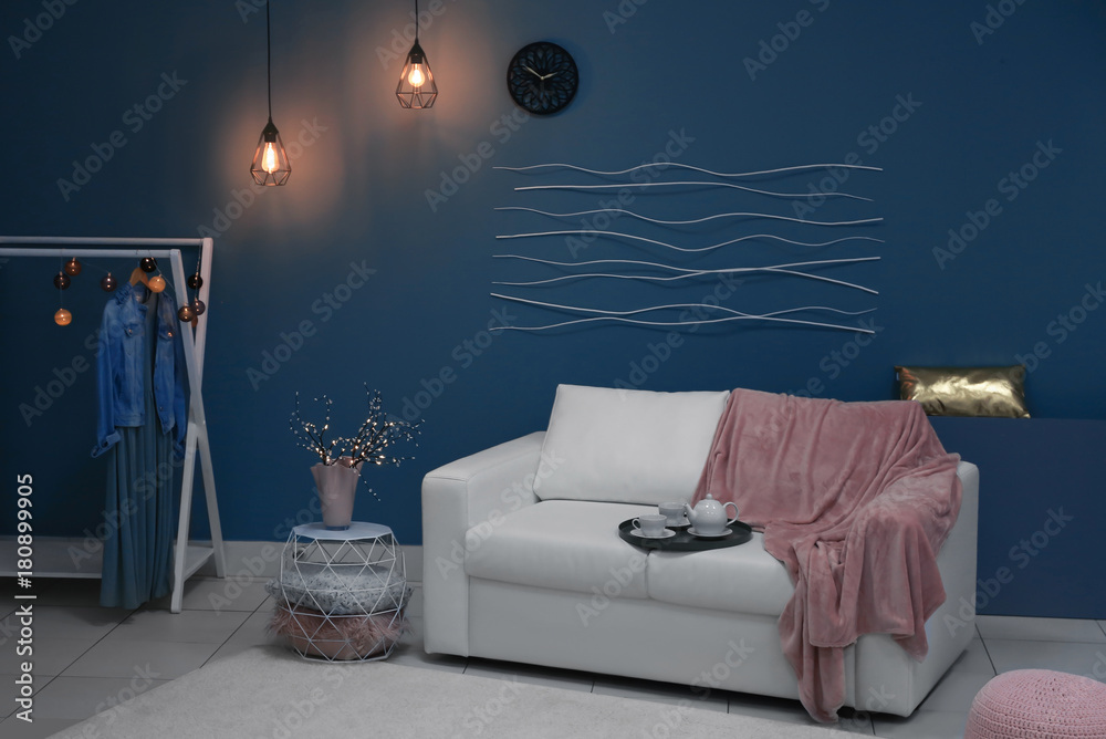 Cozy room interior with carpet on floor