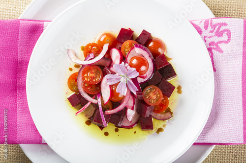 Ensalada De Remolacha Tomates Cherry Cebolla Morada Y Rabanos Con Aceite De Oliva Decorada Con Flor De Malva Buy This Stock Photo And Explore Similar Images At Adobe Stock Adobe Stock