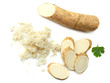 sliced horseradish root with parsley isolated on white background