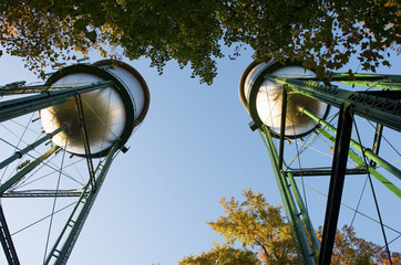 Pair of rural water towers, taken from below