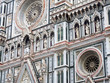 Statues and facade of the front of the Catterdrale di Santa del Fiore or Duomo di Firenze in Florence