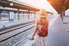 Travel Background, Woman Traveler With Baggage, Passenger Waiting For The Train On Platform Of Railway Station