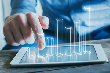 business analytics and financial technology concept, 3d chart from the screen of digital tablet computer