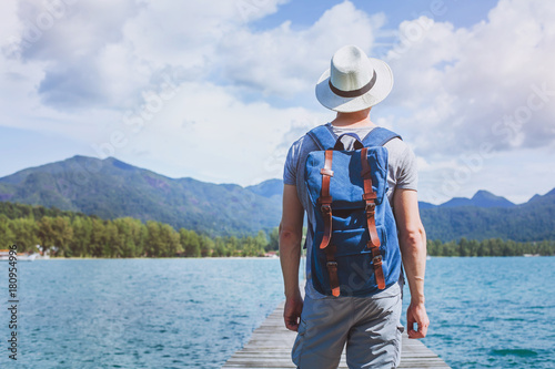 Fotomural wanderlust travel, young tourist traveler with backpack ready for summer beach o