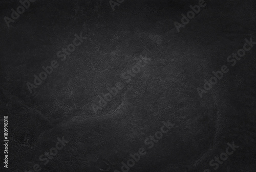 Fototapeta Dark grey black slate texture in natural pattern with high resolution for background and design art work. Black stone wall.