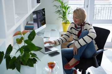 Beautiful woman using laptop