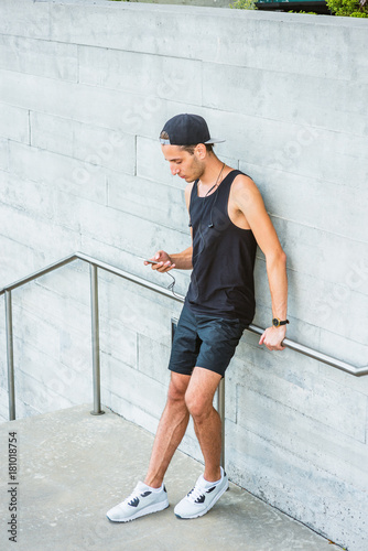 Man Summer Casual Street Fashion In New York Wearing Black Tank