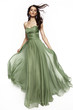 © EVGENY FREEONE - Brunette in a long dress posing