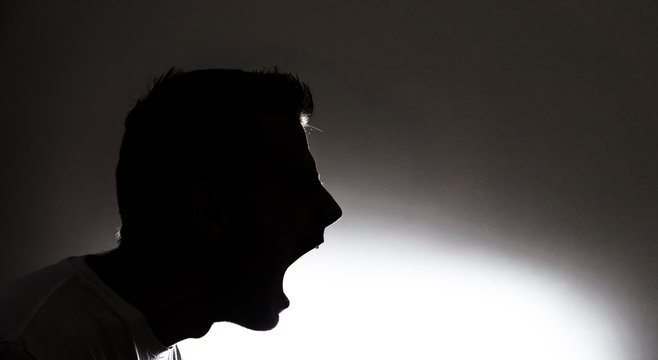 Fototapete - screaming silhouette of a man