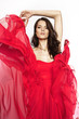 © EVGENY FREEONE - Brunette model in red dress posing