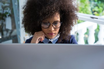 Beautiful woman working on desktop pc