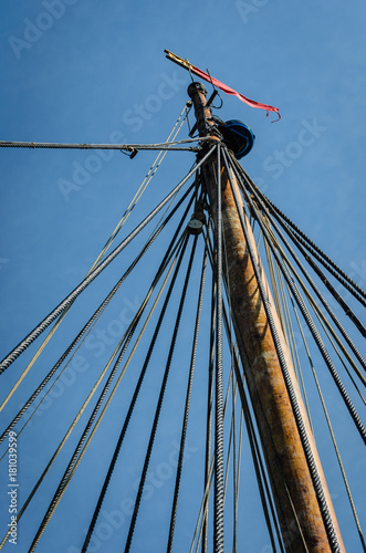 Fotografie, Obraz Vintage ship mast and ropes with modern navigation