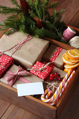Wall Mural - Wooden box with a set of Christmas gifts