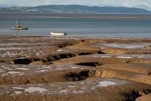 Two Boats Await Their Next Adventure In Morecambe Bay.