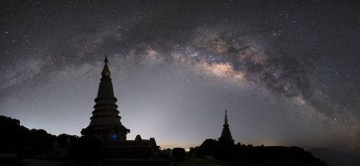 Wall Mural - panorama view of milky way, million stars on sky with pagoda in thailand.