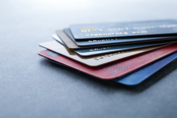 Wall Mural - Pile of credit cards on table, closeup