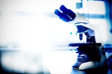 Poster - Composite image of microscope in laboratory 
