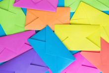 Colorful Envelopes On The Blue Background.