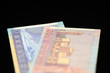 © Talulla - Banknotes of ten and twenty Lithuanian litas on a dark background