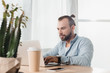 © LIGHTFIELD STUDIOS - man working with laptop