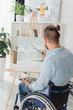 © LIGHTFIELD STUDIOS - disabled man painting