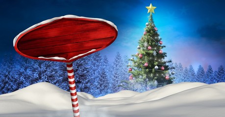 Poster - Wooden signpost in Christmas Winter landscape