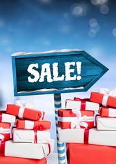 Poster - Sale text and gifts with Wooden signpost in Christmas Winter