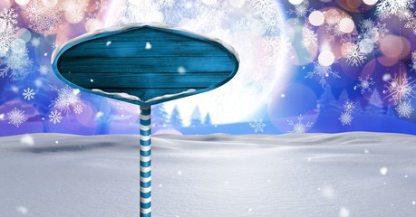 Poster - Wooden signpost in Christmas Winter landscape