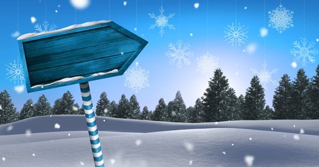 Poster - Wooden signpost in Christmas Winter landscape