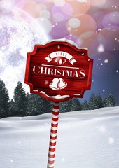 Poster - Merry Christmas text on Wooden signpost in Christmas Winter