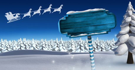 Poster - Wooden signpost in Christmas Winter landscape and Santa's sleigh