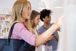 © PhotoAlto - Women shopping together
