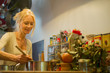 © PhotoAlto - Mature woman cooking at home