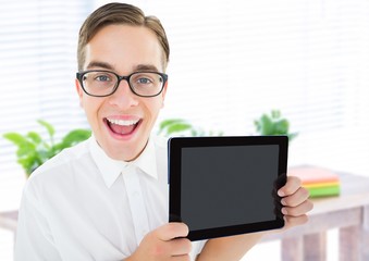 Poster - Man holding tablet with bright plants background