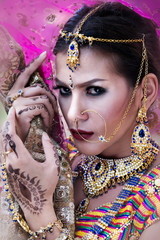 Wall Mural - Close up Beautiful indian girl Young hindu woman model with kundan jewelry.