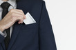 © Rawpixel.com - Businessman putting a business card into his pocket