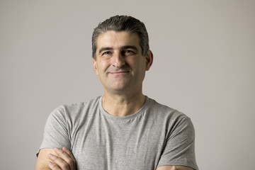 white man 40 to 50 years old smiling happy showing nice and positive face expression isolated on grey background