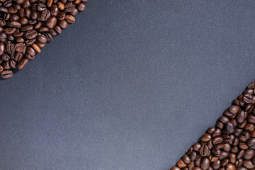 Wall Mural - Coffee beans frame on dark background