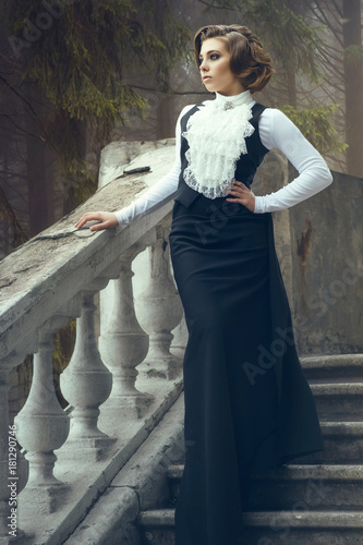 Portrait Of Gorgeous Woman With Elegant Hairstyle Wearing