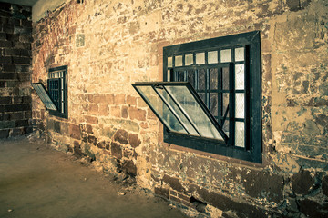 Poster - Rough stone interior wall with grunge windows