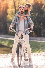 Poster - Couple with a tandem bicycle