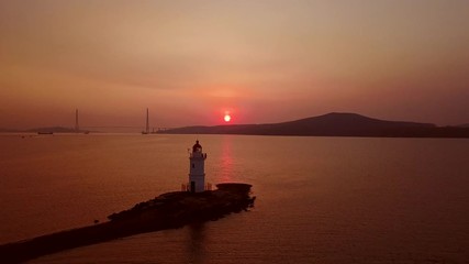 Wall Mural - Aerial view of the Tokarevskiy lighthouse - one of the oldest lighthouses in the Far East, still an important navigational structure and popular attractions of Vladivostok city, Russia.