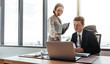 © Jacob Lund - Business people discussing and analyzing documents
