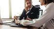 © Jacob Lund - Happy corporate professionals discussing over new project