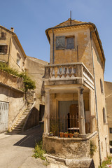 Old house in the medieval village Simiane-la-Rotonde, Provence, France