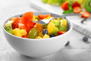 Sticker - Bowl of fresh fruit salad on table