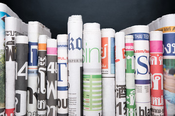 Newspapers folded and stacked