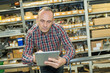 © auremar - smith with tablet pc computer at warehouse
