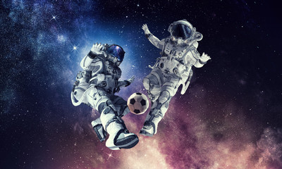Wall Mural - Astronaut play soccer game