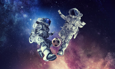Wall Mural - astronaut play soccer game